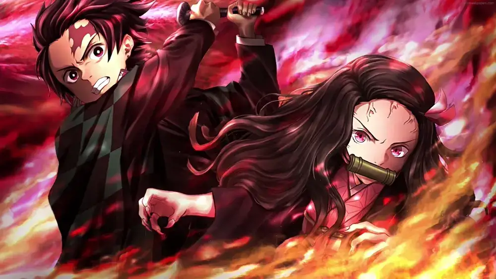 Tanjiro y Nezuko Kamado entre llamas – Fondo de Pantalla Animado